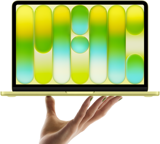MacBook Neo in citrus colour, balanced on fingertips of open hand, screen displaying colourful abstract pattern